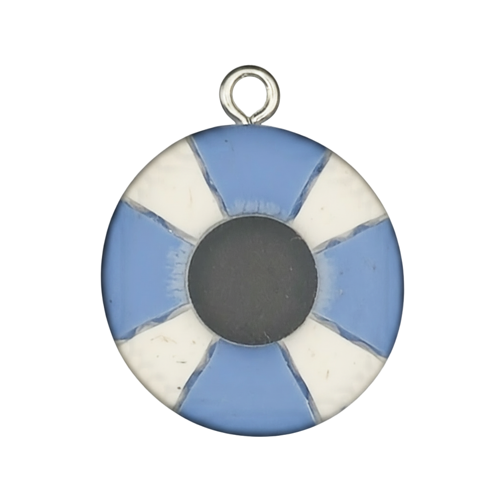 close-up of round blue and white lifebuoy charm with dark center on black background