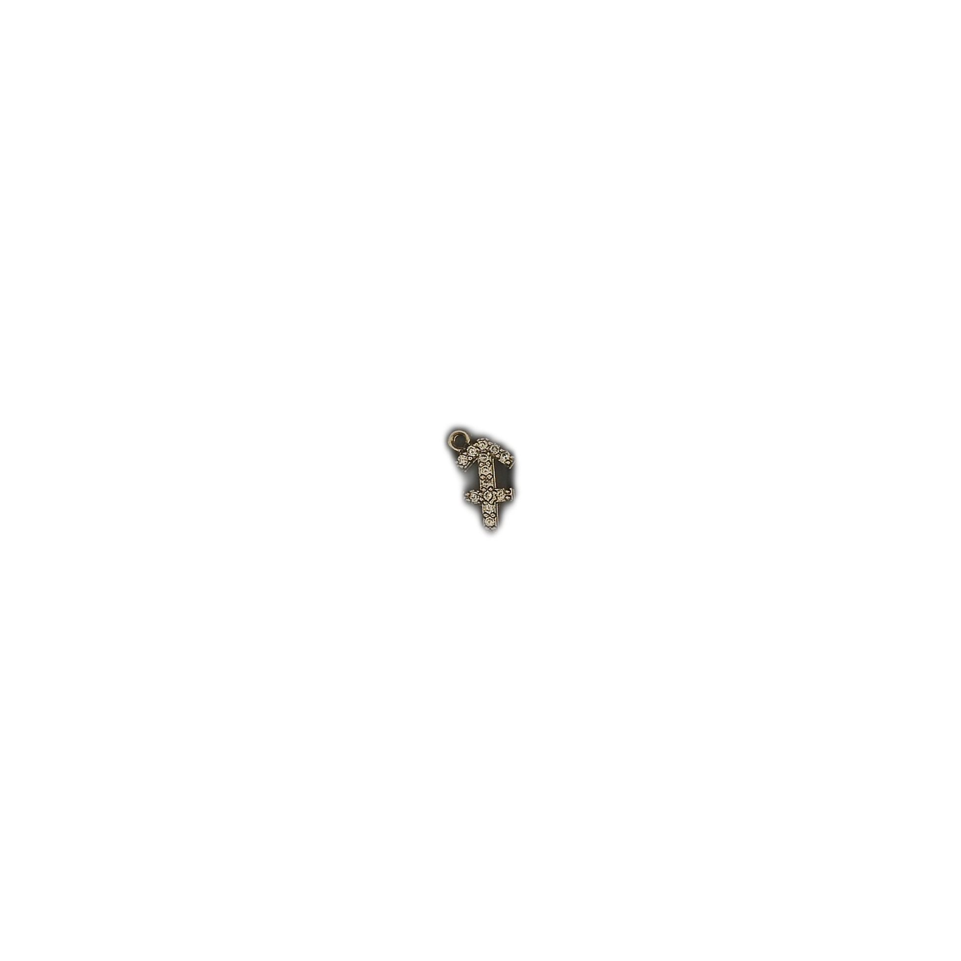 small gold-tone pavé Sagittarius charm on a black background