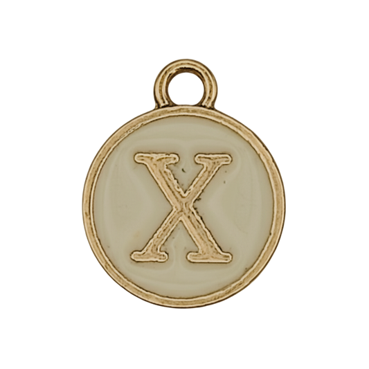 close-up of round gold-tone letter X charm with cream enamel