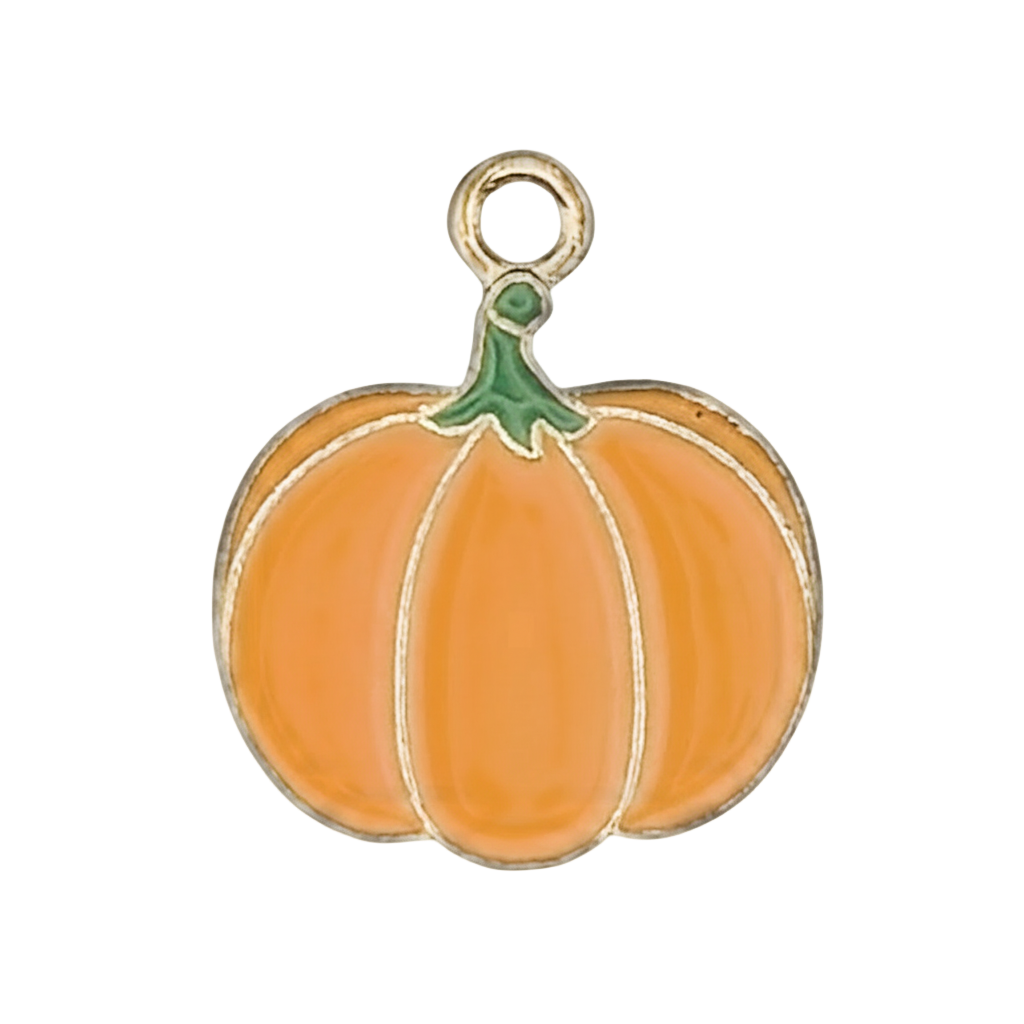 close-up of orange enamel pumpkin charm with green stem and gold-tone outline