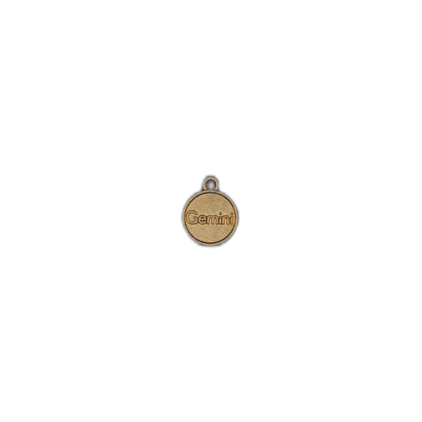 small gold-tone Gemini round charm centered on black background