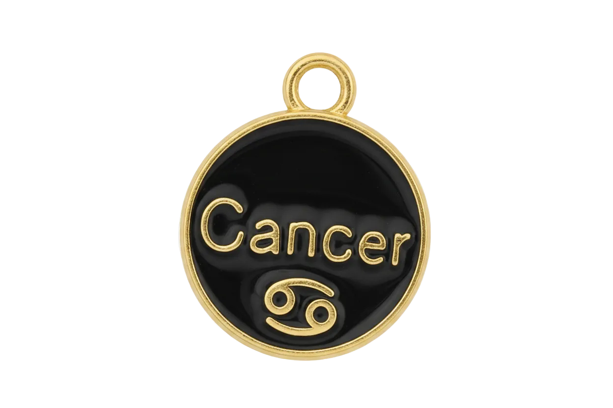 close-up of round black enamel charm with the word 'Cancer' in gold