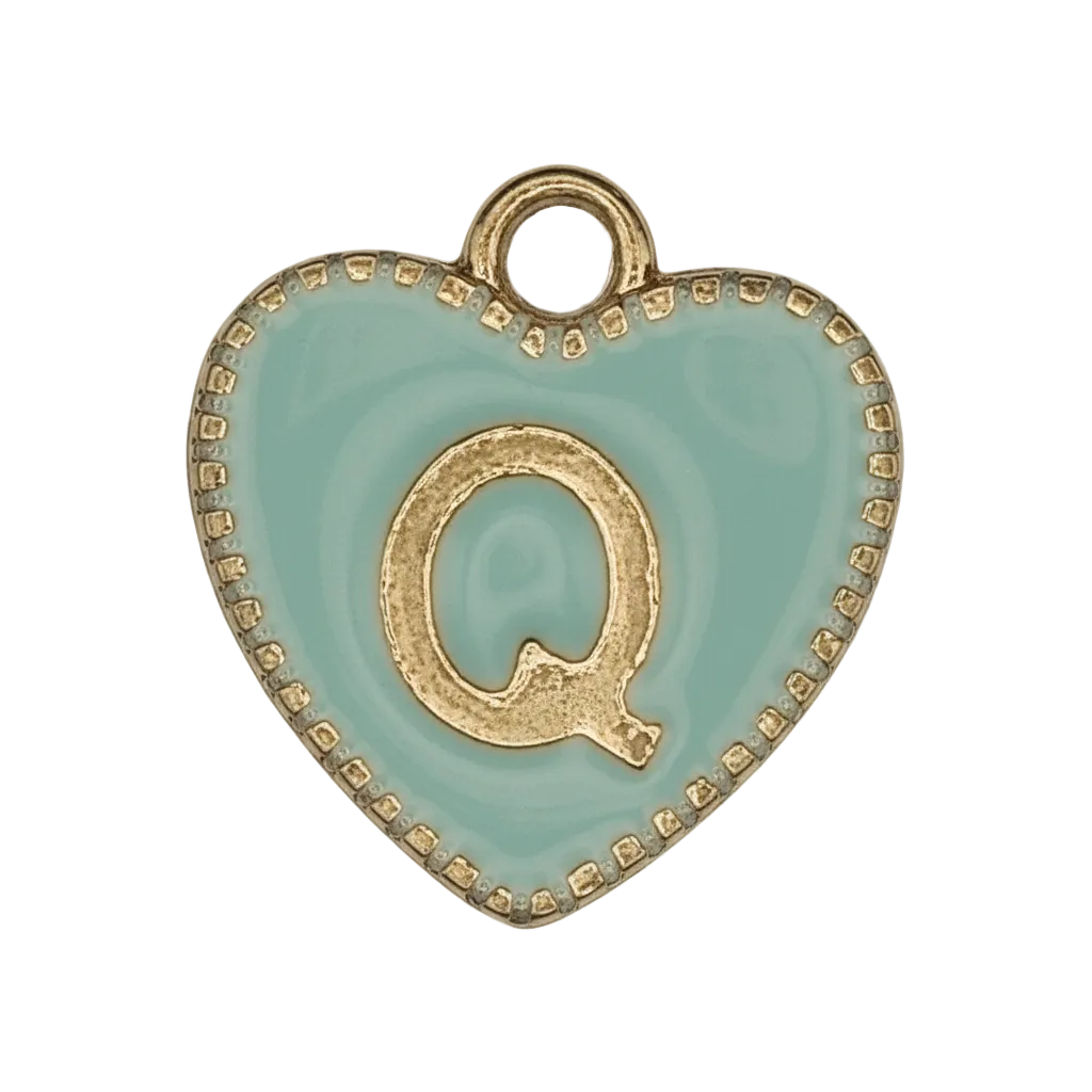 close-up of mint heart charm with gold letter Q
