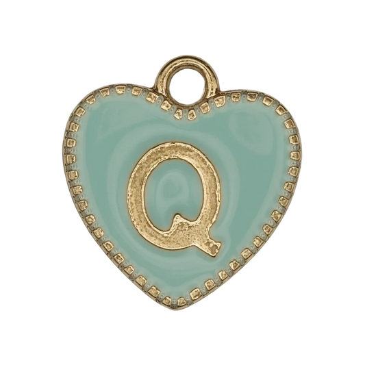 close-up of mint heart charm with gold letter Q