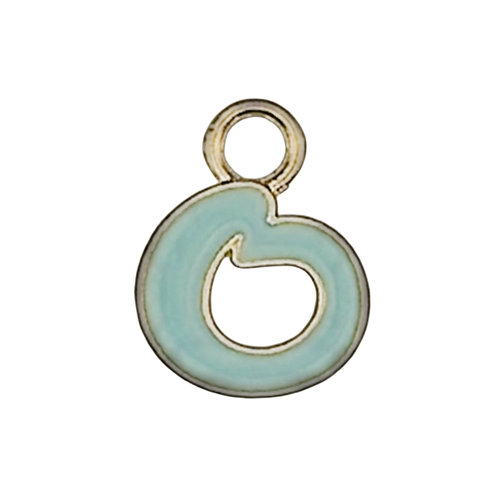 Close-up of a small gold-tone lowercase g charm with light blue enamel on a black background.
