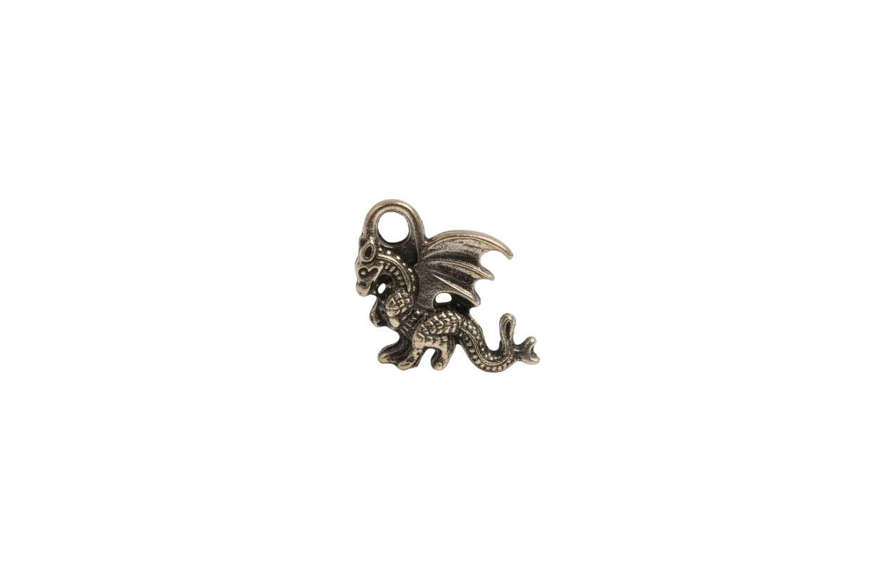 small metal winged dragon charm centered low on a black background
