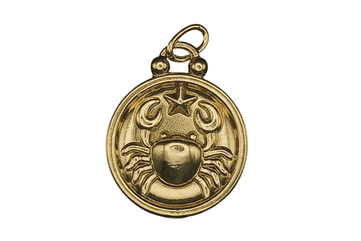 close-up of round gold-tone charm with raised crab and star
