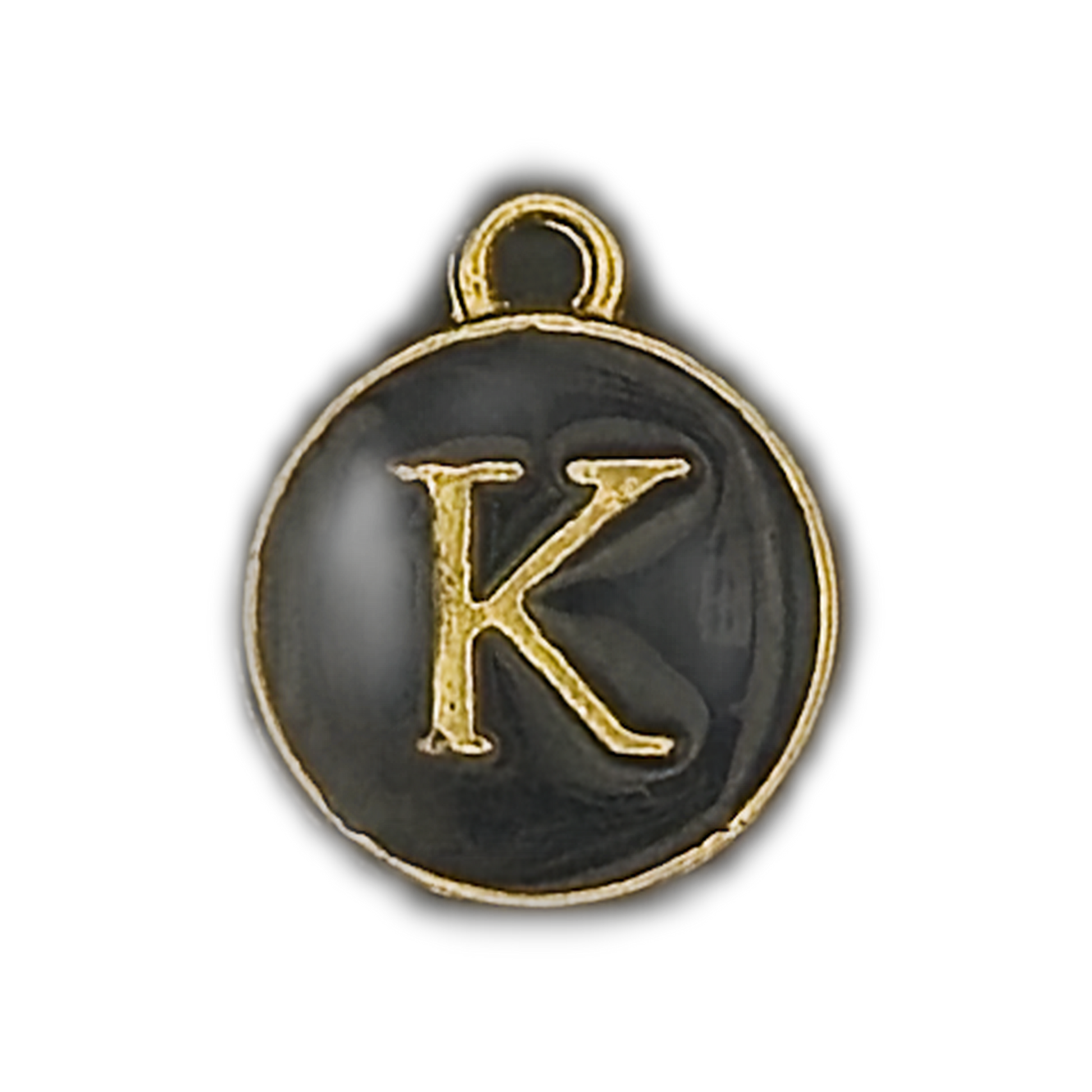 close-up of round black enamel charm with gold letter K