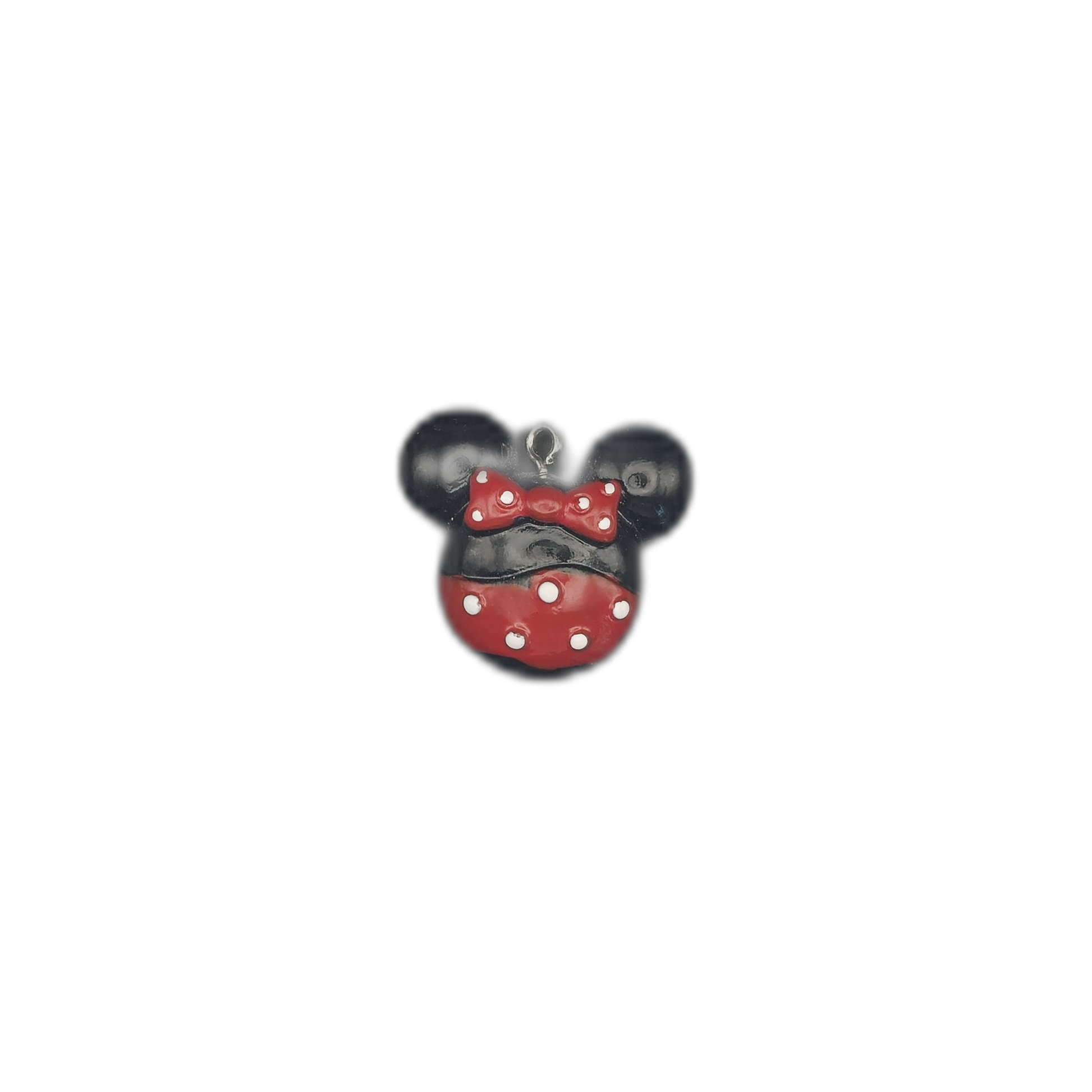 small black and red mouse head charm with bow and white polka dots on a black background