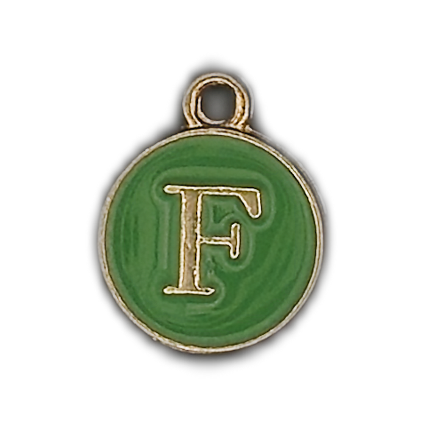 close-up of round green enamel charm with gold-tone letter F