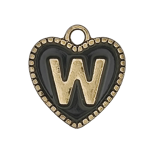 close-up of gold letter W on black heart charm with dotted border
