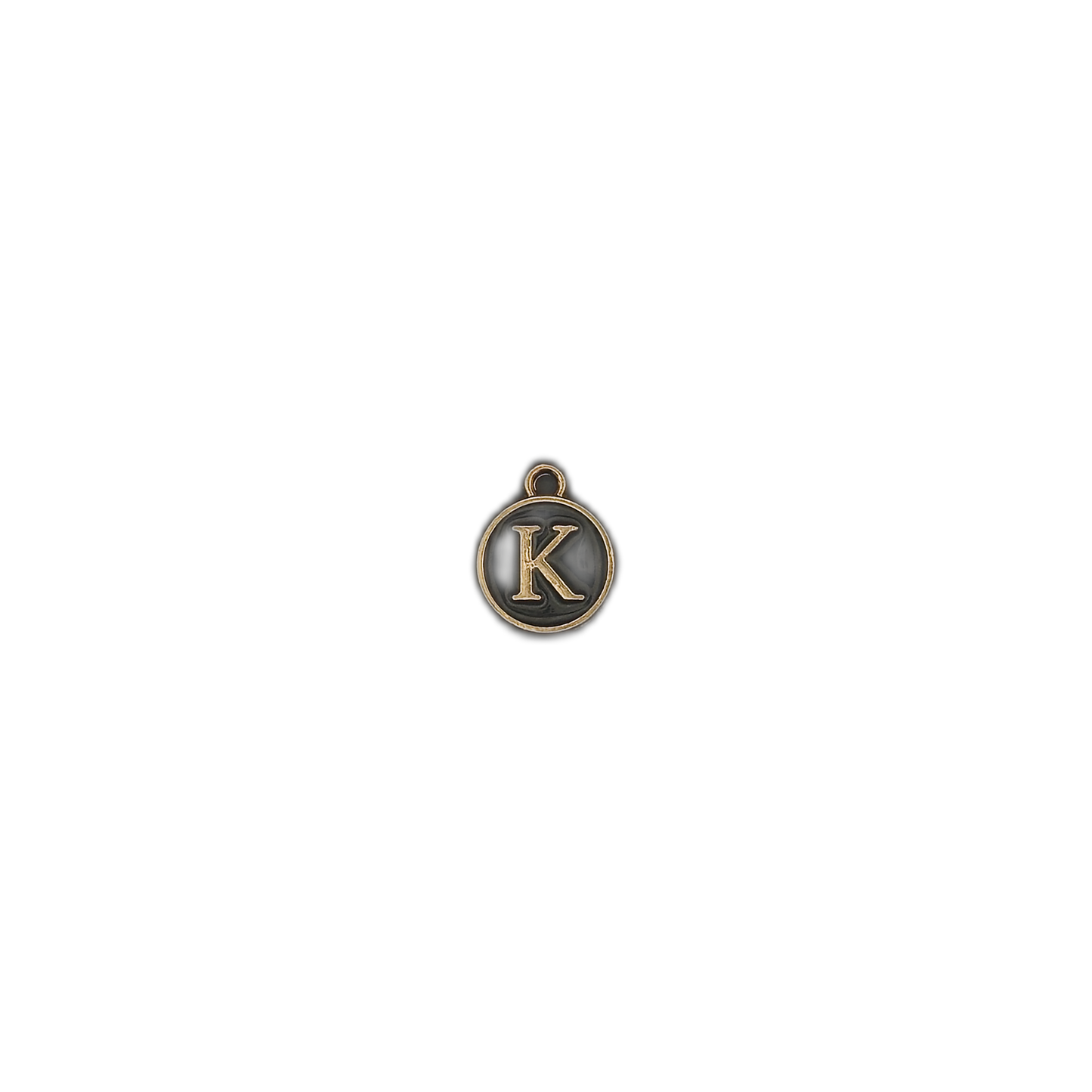small round charm showing gold letter K on black background