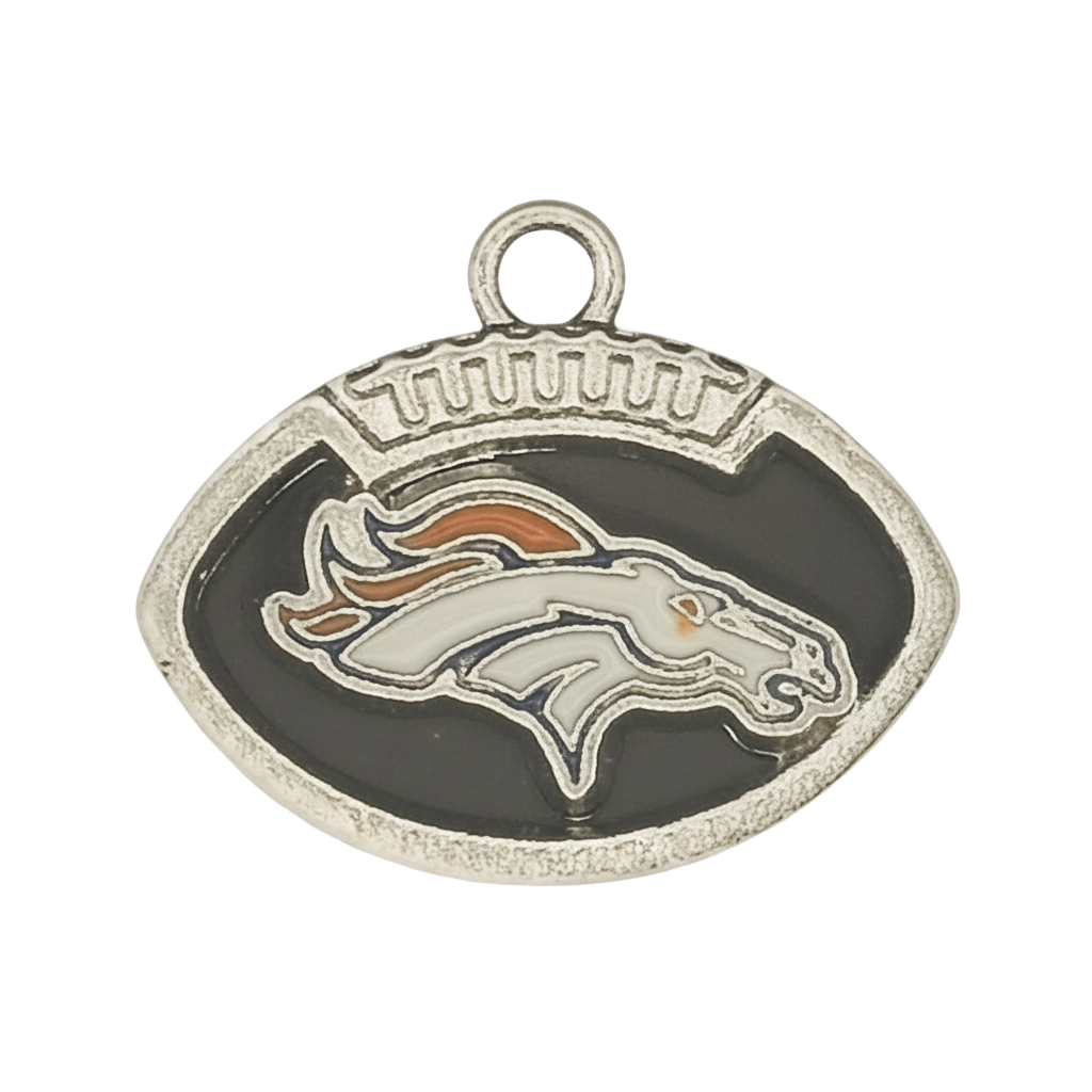close-up of silver-tone football-shaped charm with stylized horse head on black enamel