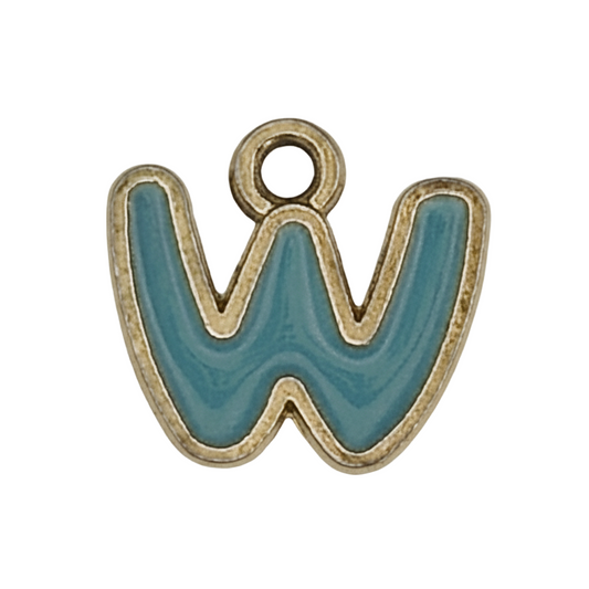 close-up of teal letter W charm with gold outline on black background