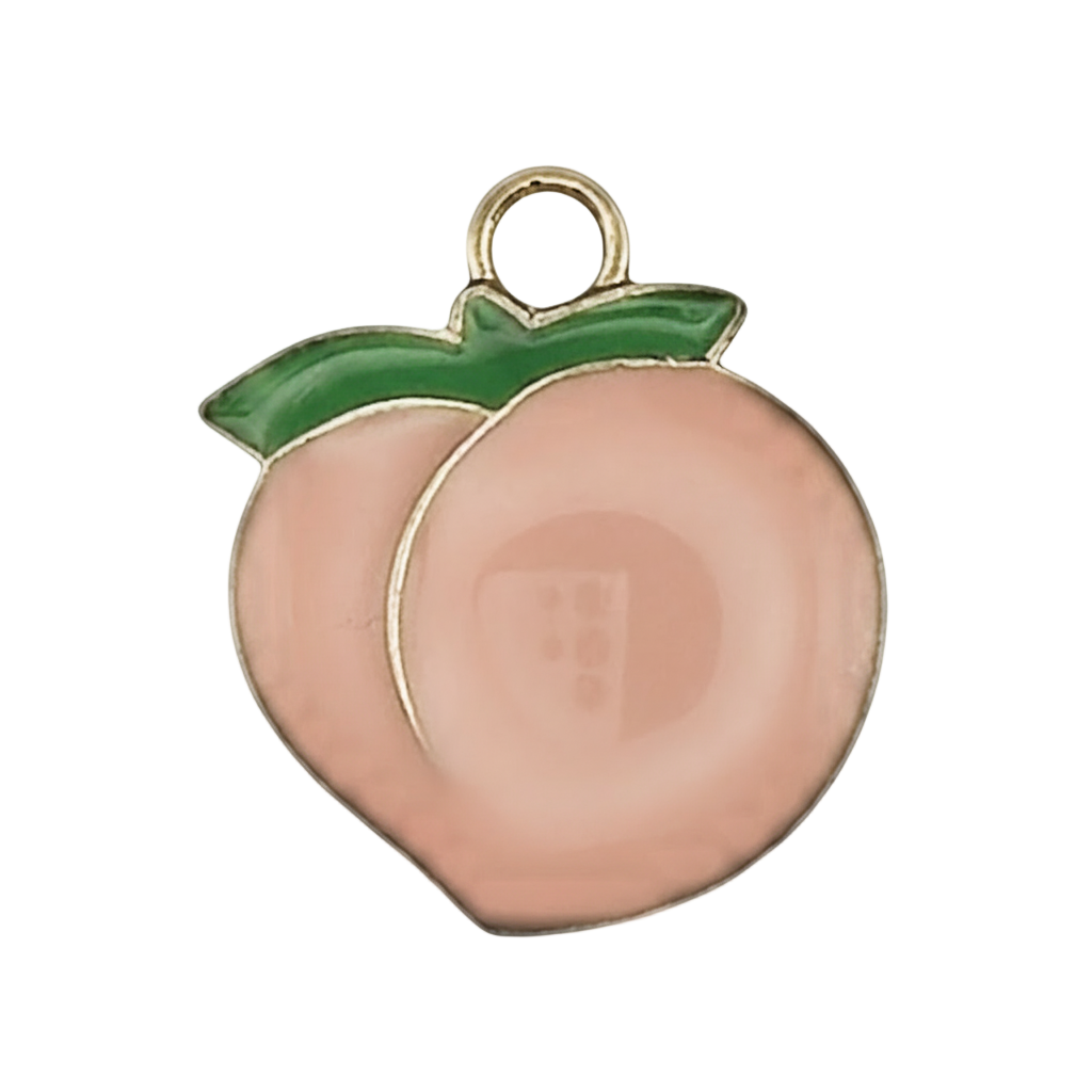 close-up of pink enamel peach charm with green leaves and gold outline