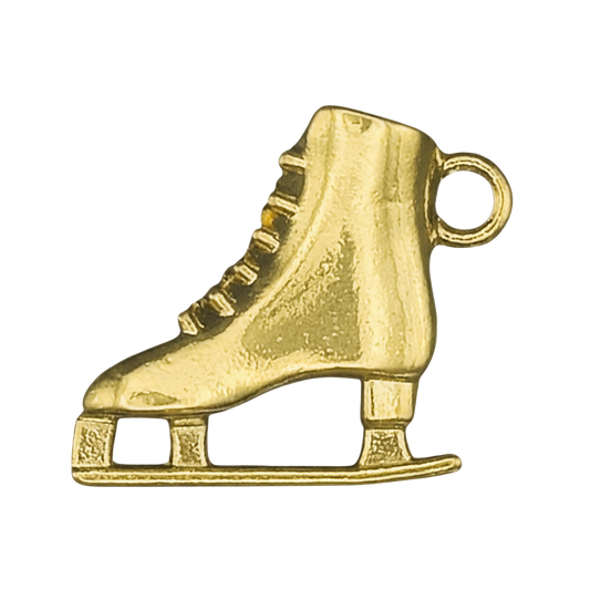 close-up gold ice skate charm on black background