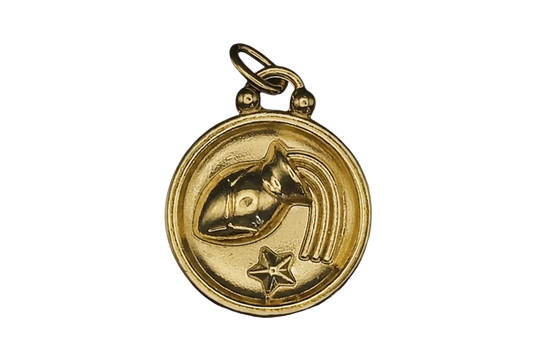 close-up of gold round Aquarius zodiac charm with jug and star on black background