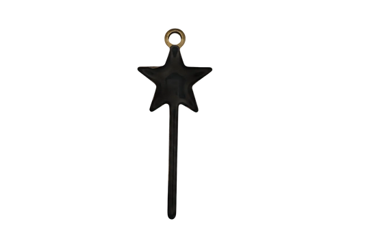 close-up of a black shooting star charm with a trailing tail