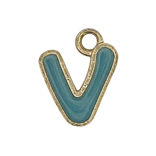 close-up of teal lowercase letter v charm with gold outline on black background
