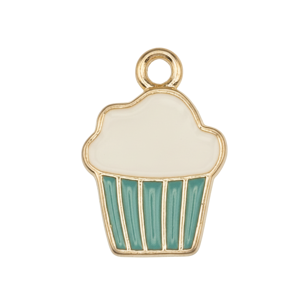 close-up of cupcake-shaped enamel charm with white icing and teal wrapper, gold outline