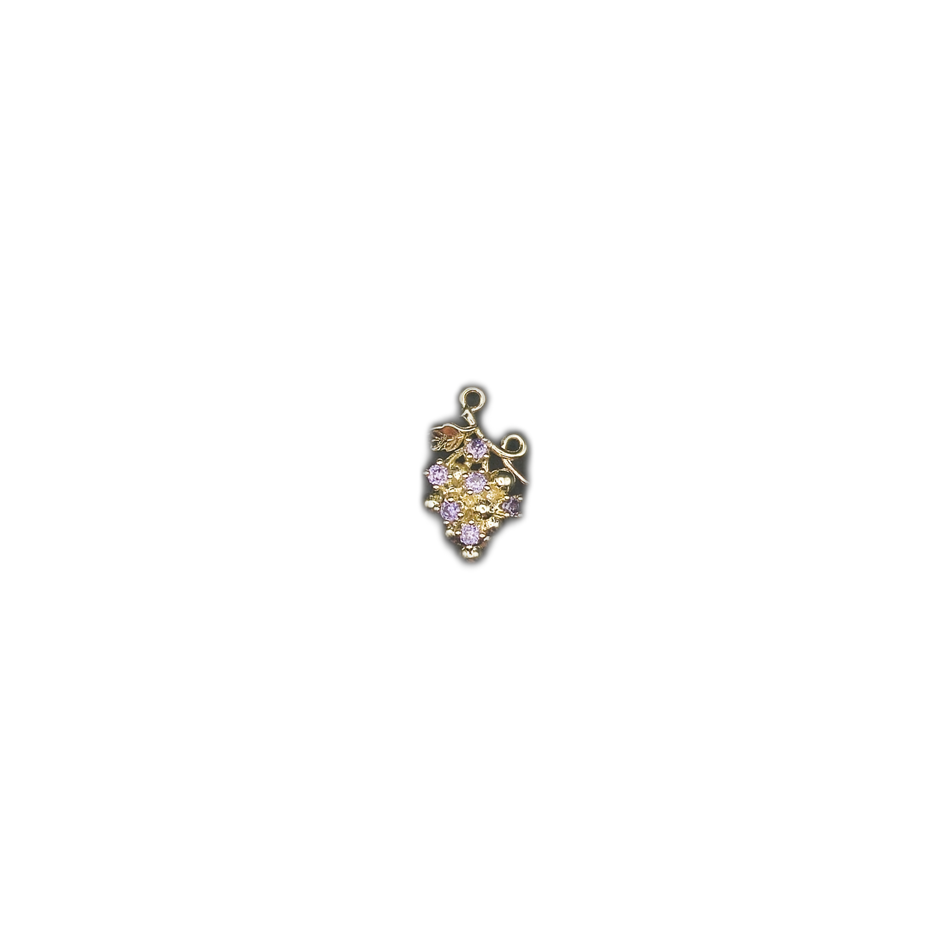 Small gold-tone grape cluster charm with purple stones centered on a black background.