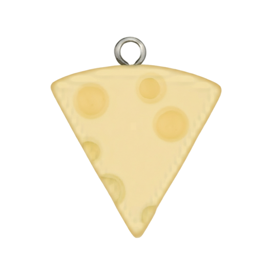 close-up of a yellow cheese wedge charm on a black background