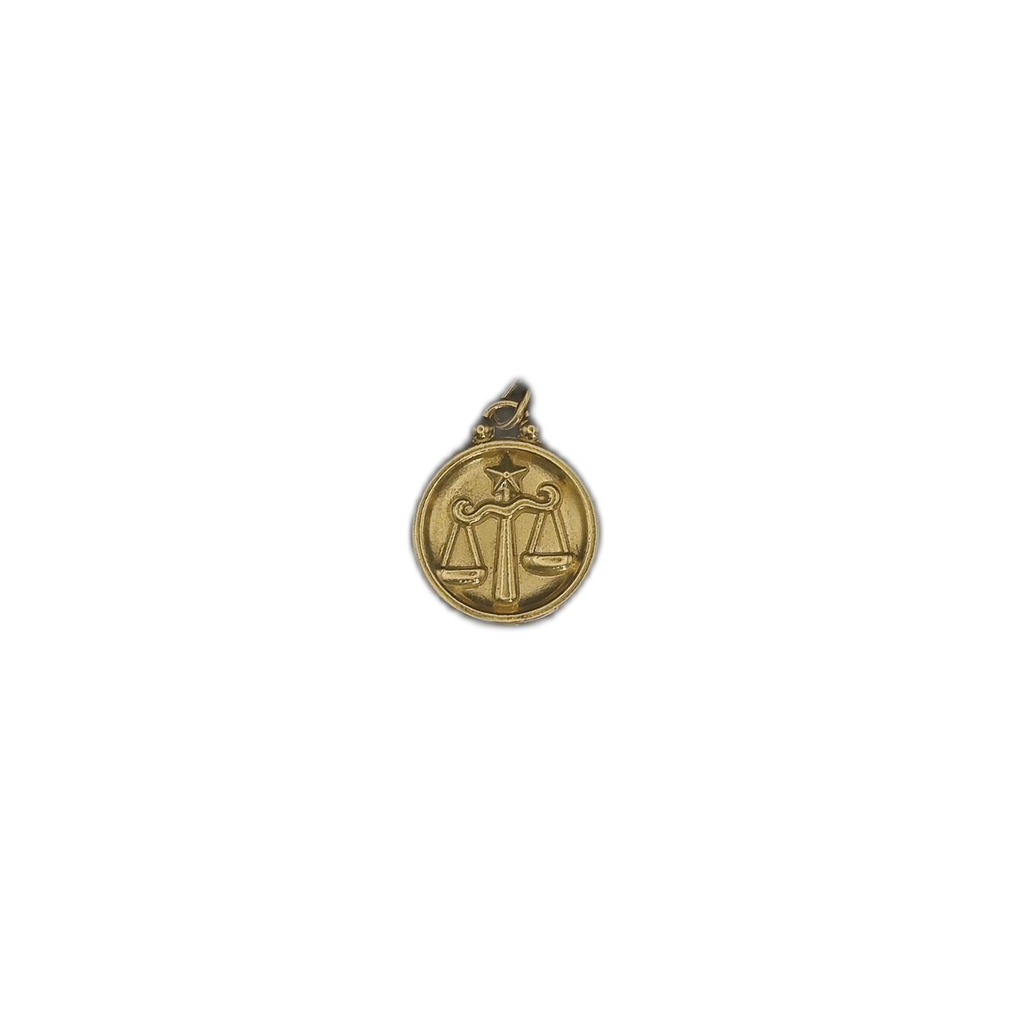 gold round Libra scales charm centered on black background