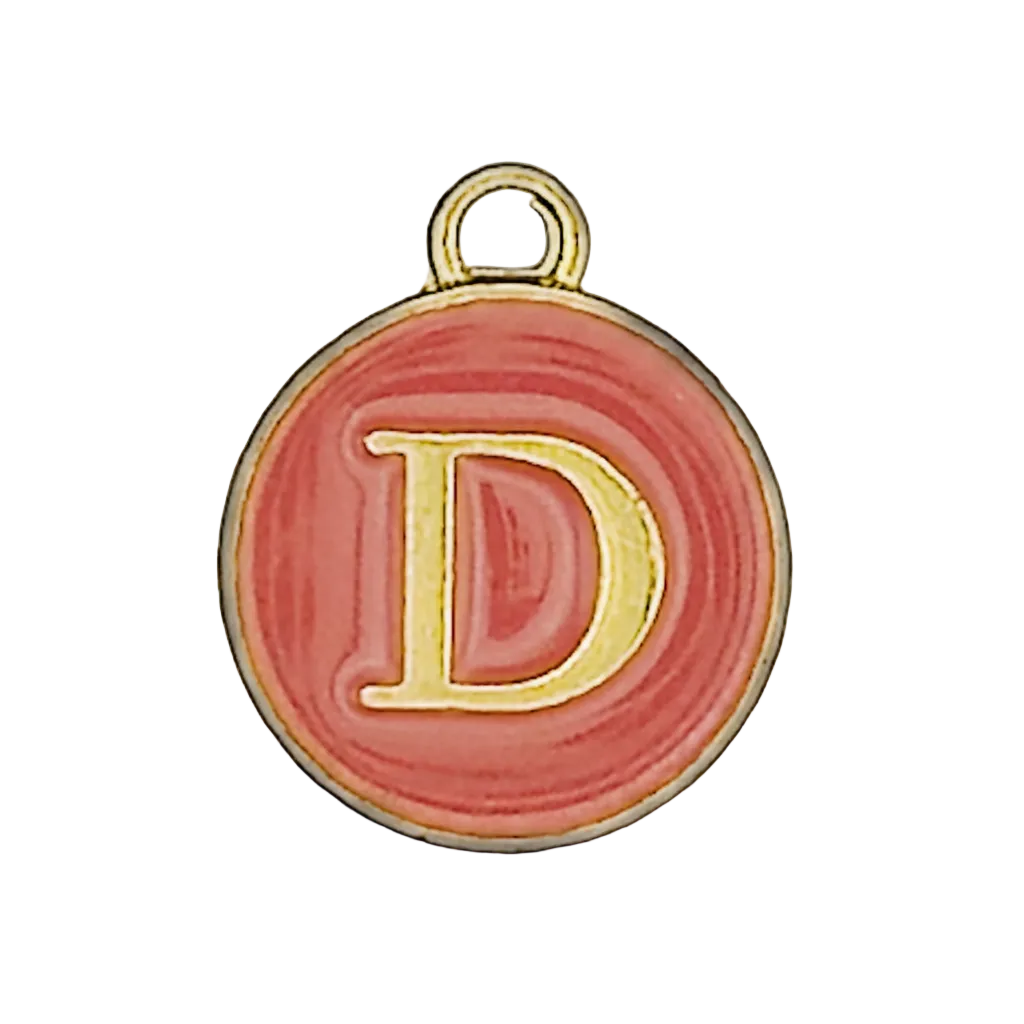 close-up of round pink charm with gold letter D