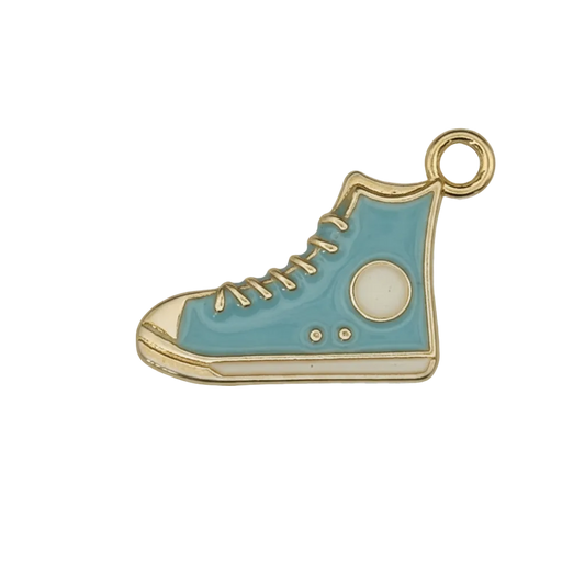 close-up of blue high-top sneaker charm with gold outline