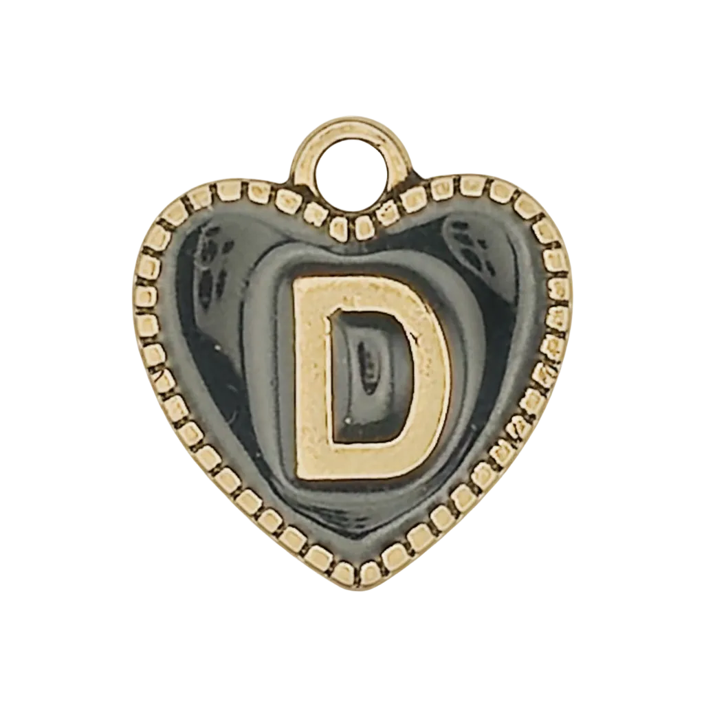 close-up of a heart-shaped charm with gold letter D on black background