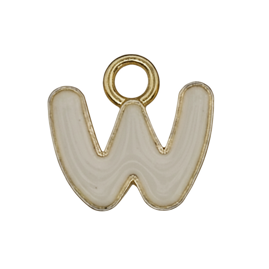 close-up of white enamel letter W charm with gold outline on black background