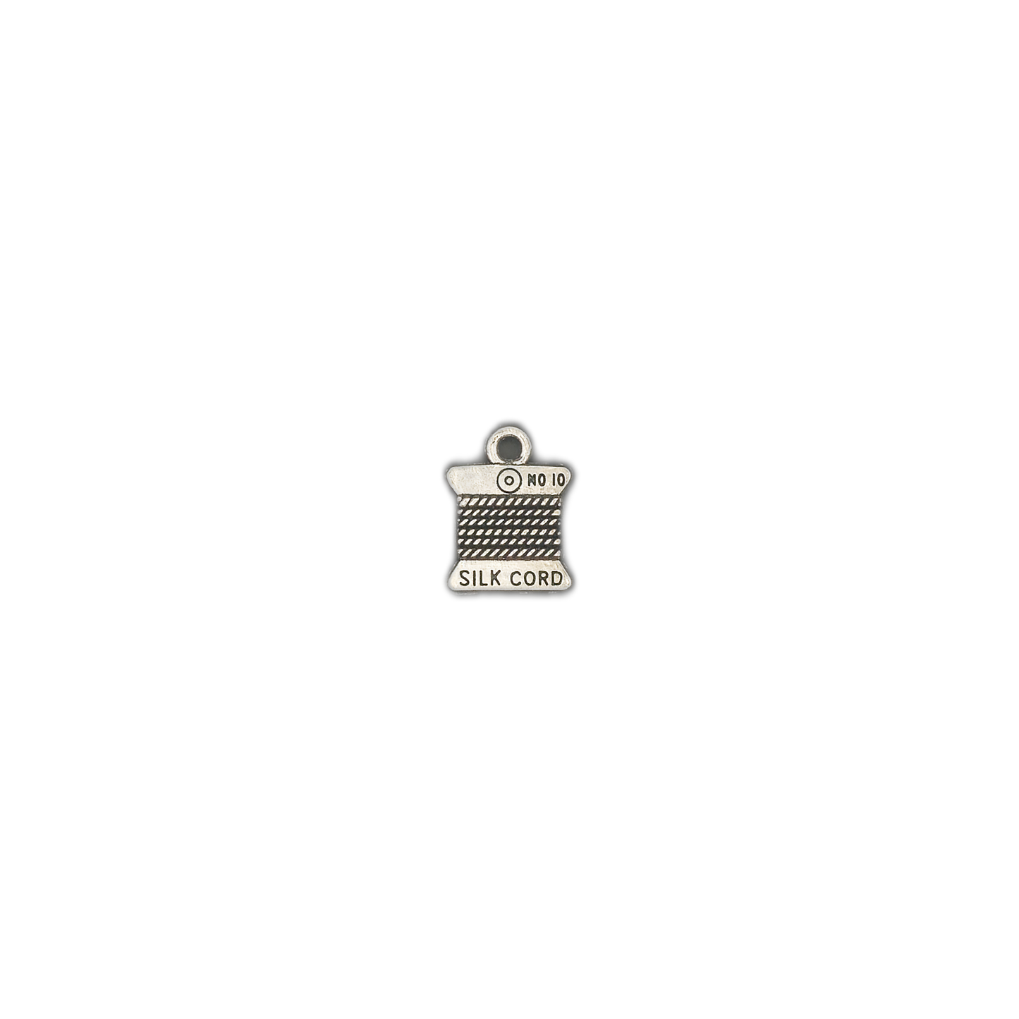 Small silver-tone silk cord spool charm centered on a black background.