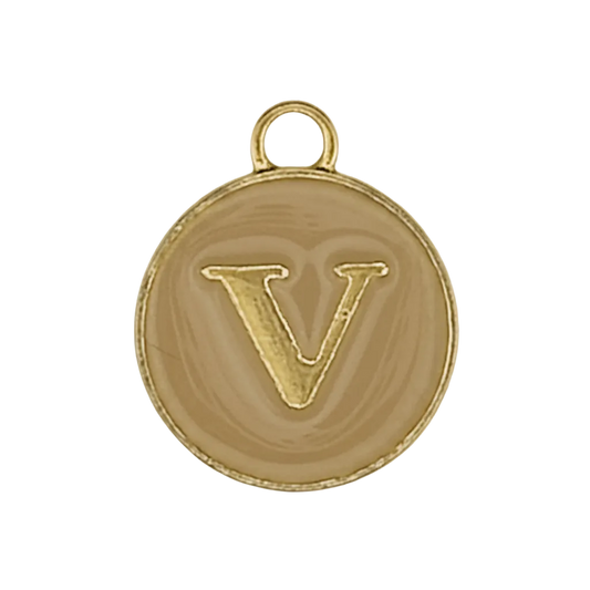 close-up of round gold letter V charm