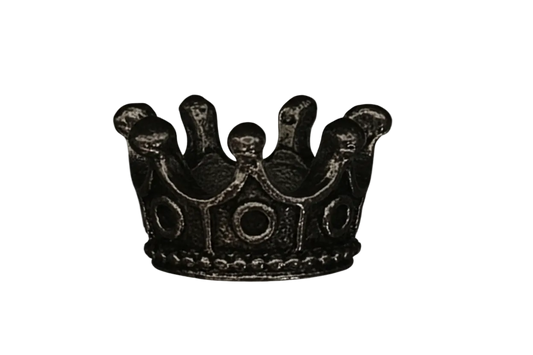 close-up of a dark silver crown charm on a black background