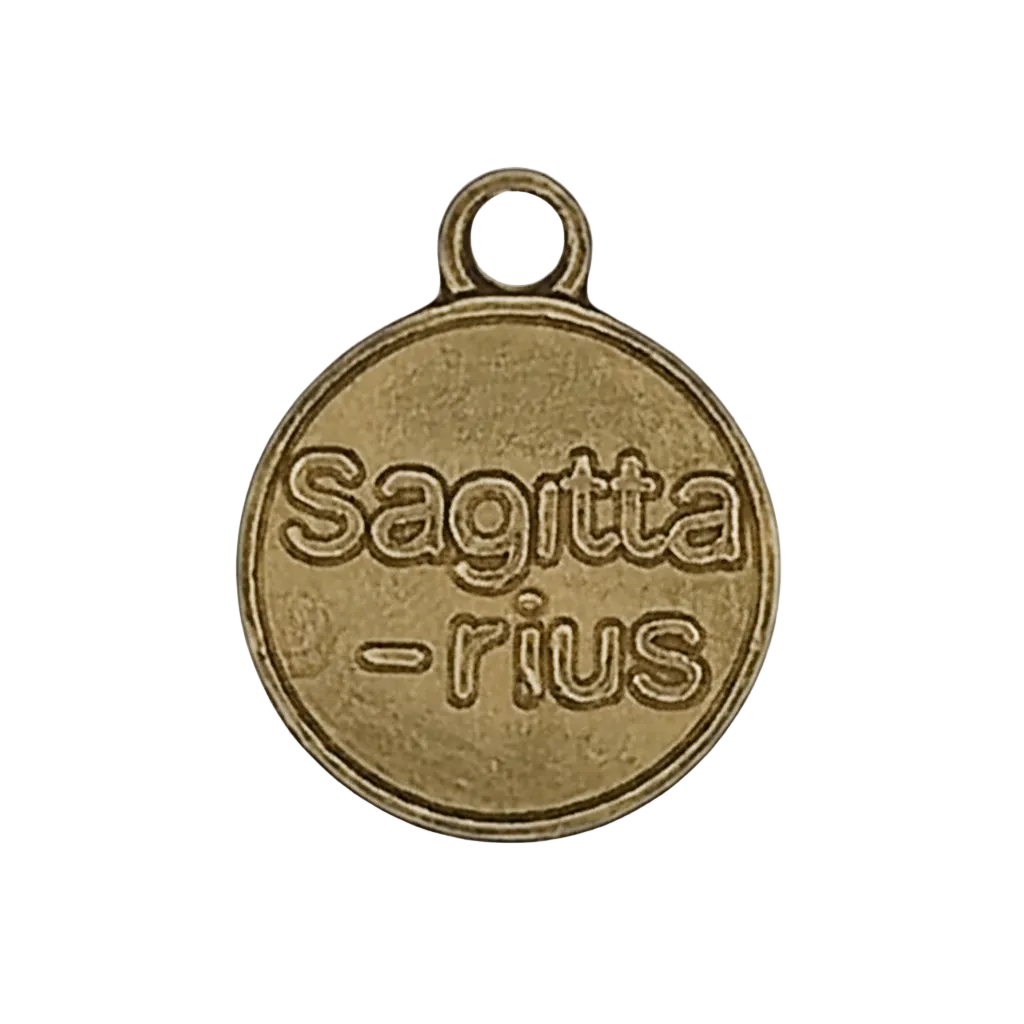 close-up of round gold-tone charm reading 'Sagittarius'