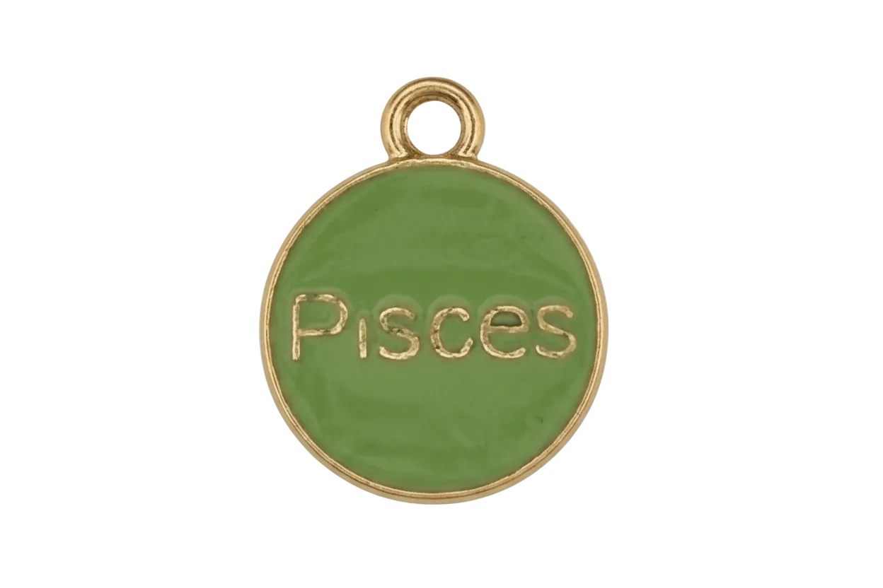 Close-up of a round green enamel charm with gold 'Pisces' text and edge on a black background.