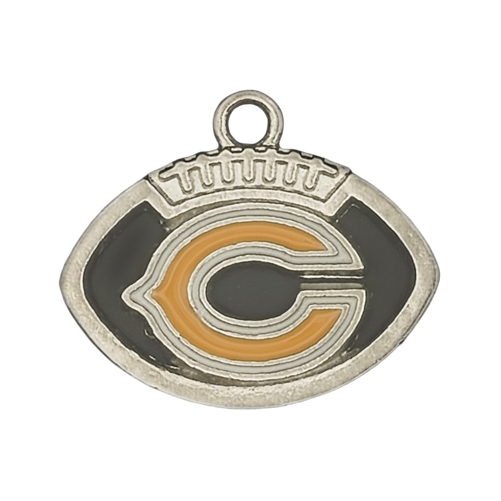 close-up of football-shaped charm with orange outlined C on black enamel and silver edges