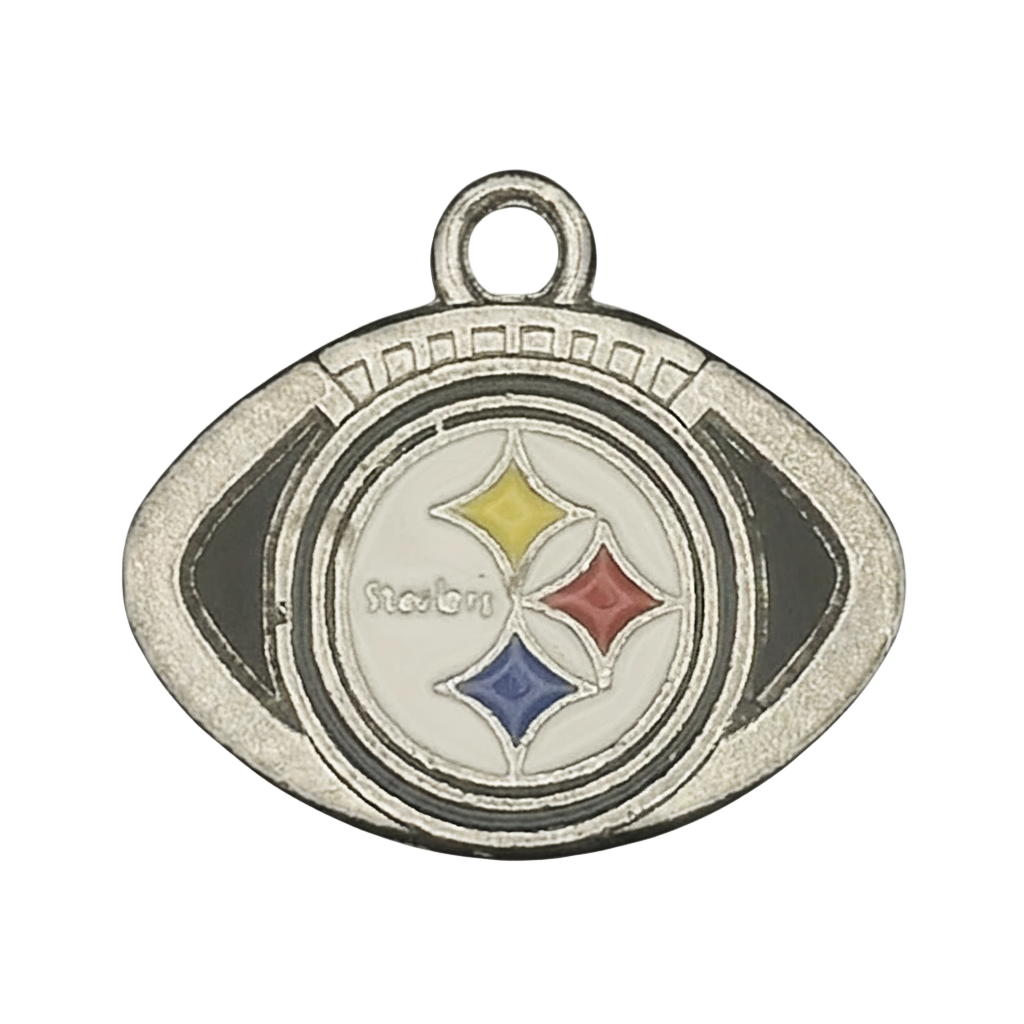 Close-up of a silver-tone football-shaped charm with a circular center and yellow, red, and blue diamond shapes.