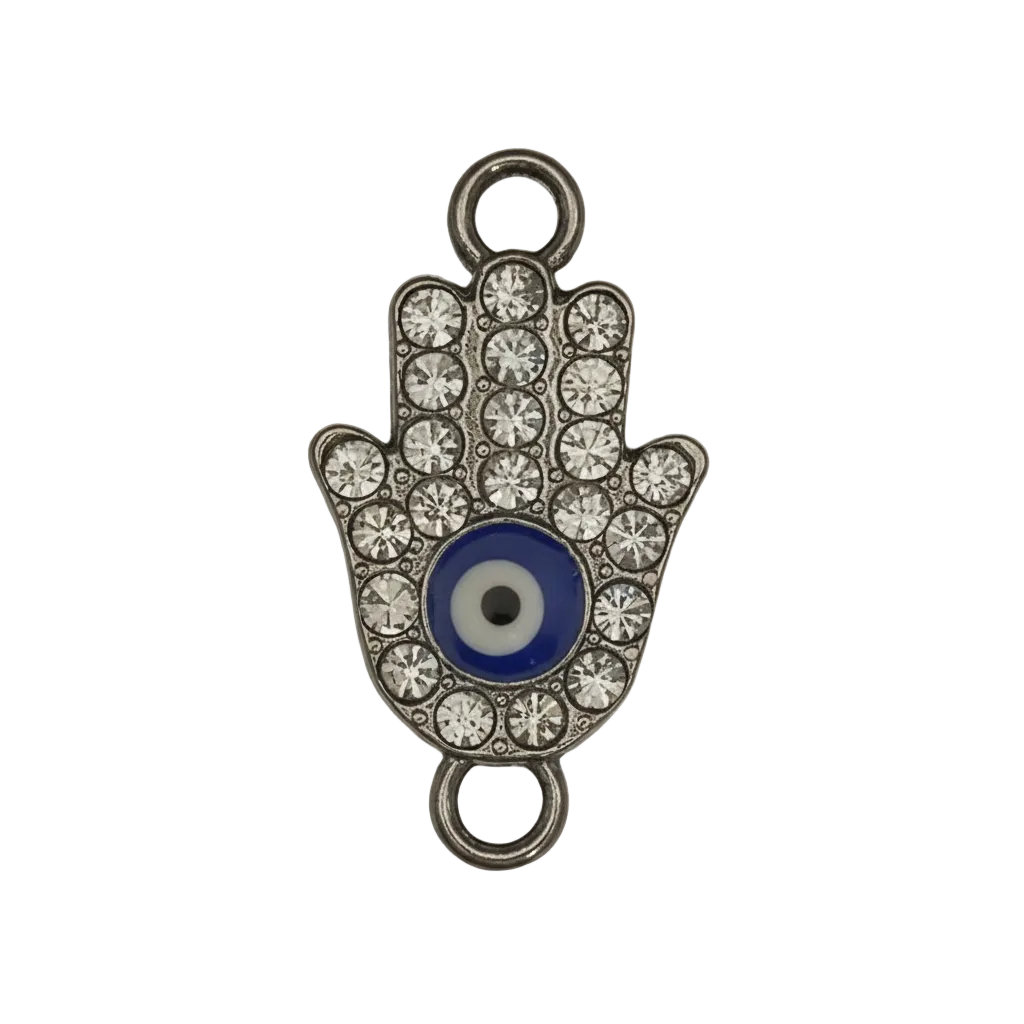 close-up of a rhinestone hamsa hand charm with blue evil eye on black background