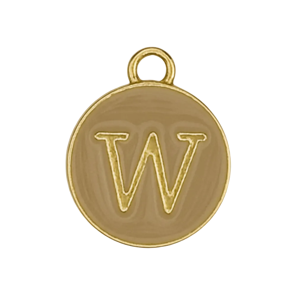 close-up of a gold round charm with letter W