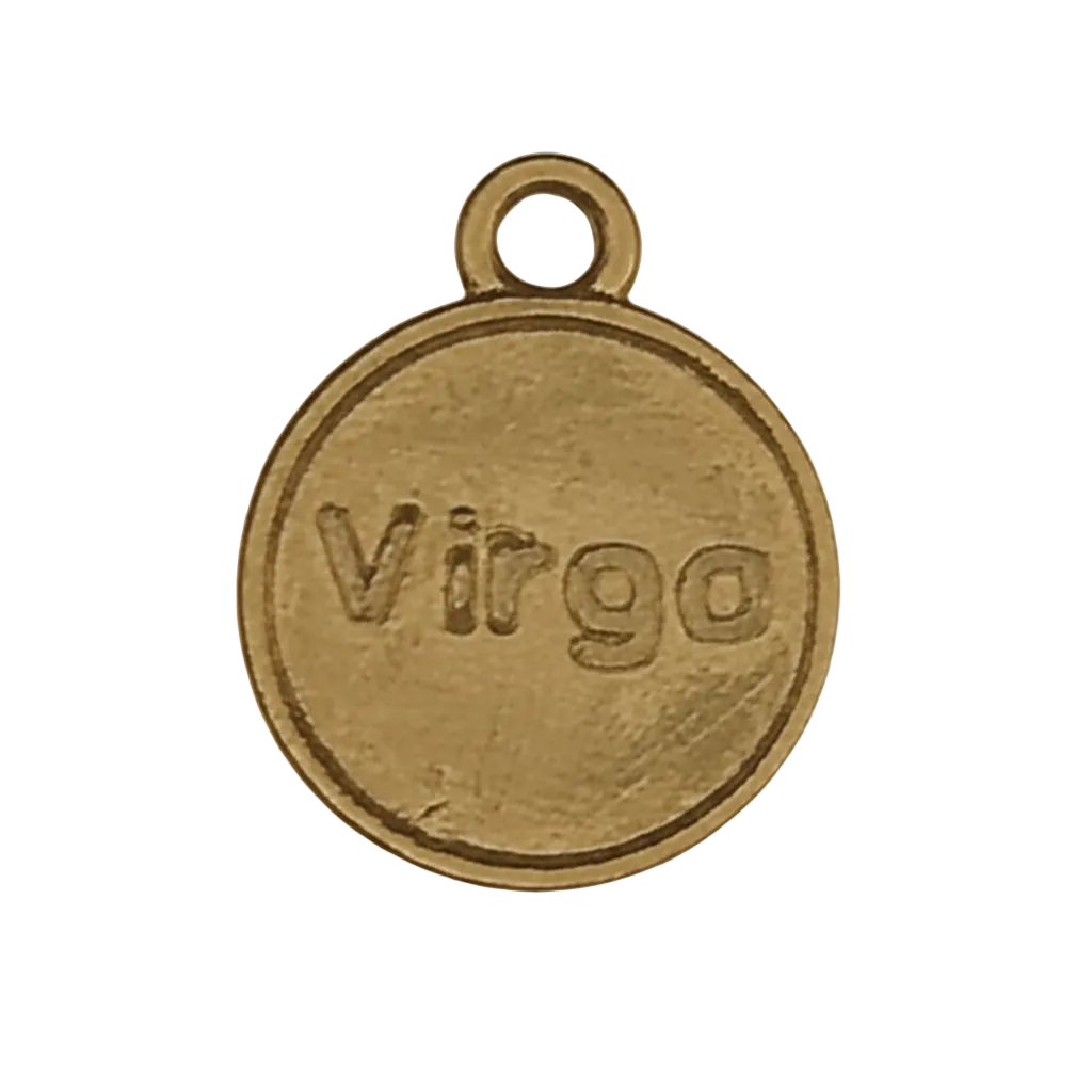 close-up of round gold-tone charm engraved 'Virgo' on a black background