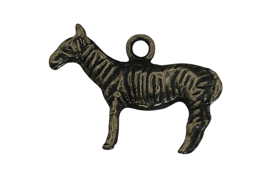 close-up of antique brass zebra charm