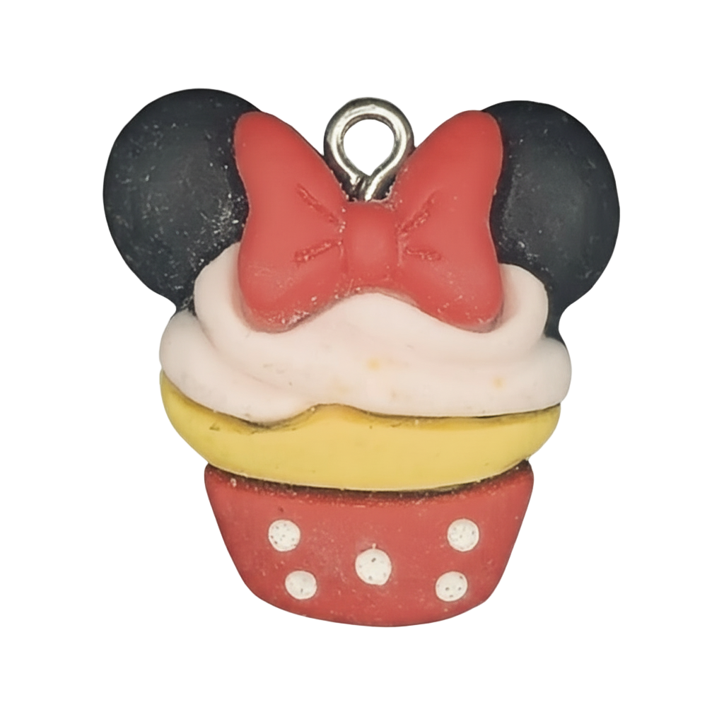 close-up of cupcake charm with black ears and red bow