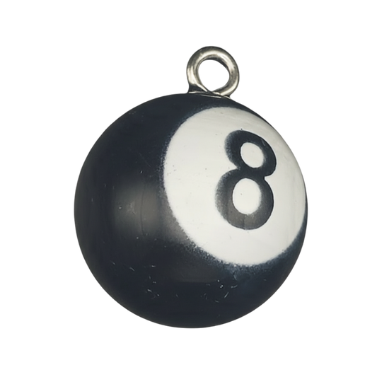 close-up of black and white 8-ball pool charm with small metal loop