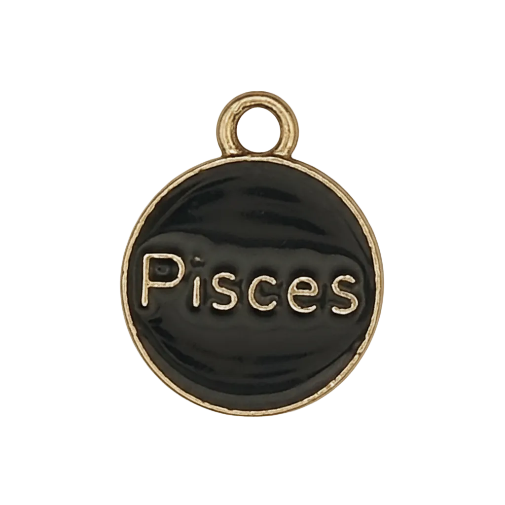 Close-up of round black and gold Pisces charm