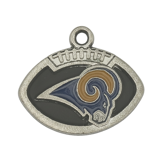 close-up of football-shaped charm with ram head in navy and gold