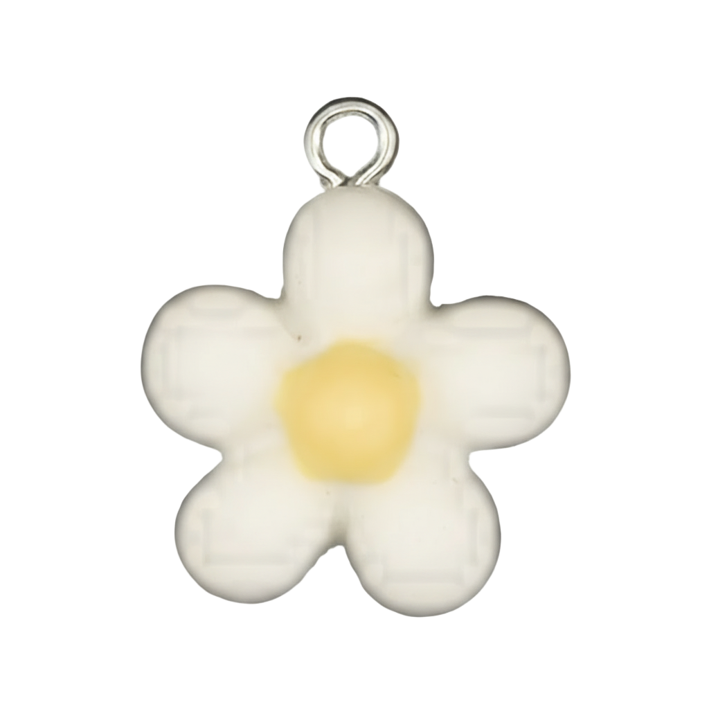 close-up of a small white daisy charm with a yellow center on a black background