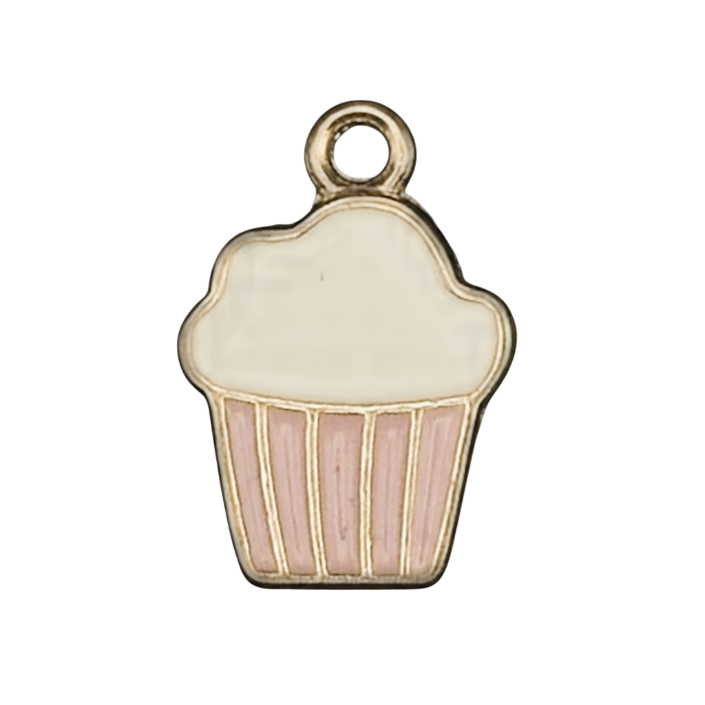 close-up of pink and white cupcake enamel charm with gold outline on a black background