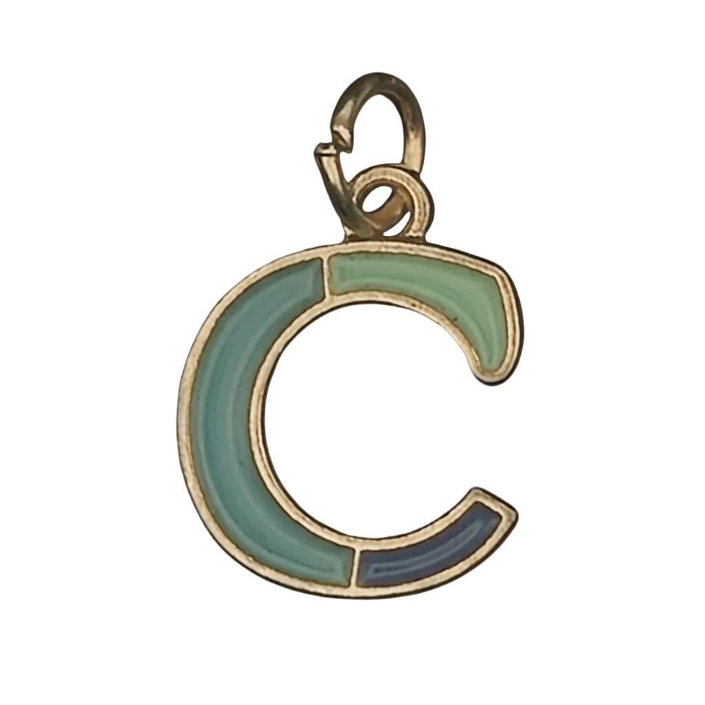 close-up of gold-tone letter C charm with green and blue enamel