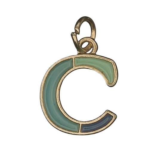 close-up of gold-tone letter C charm with green and blue enamel